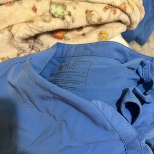 Ciel blue figs. Worn a lot. M/T cargo pants + small Rafaela top.